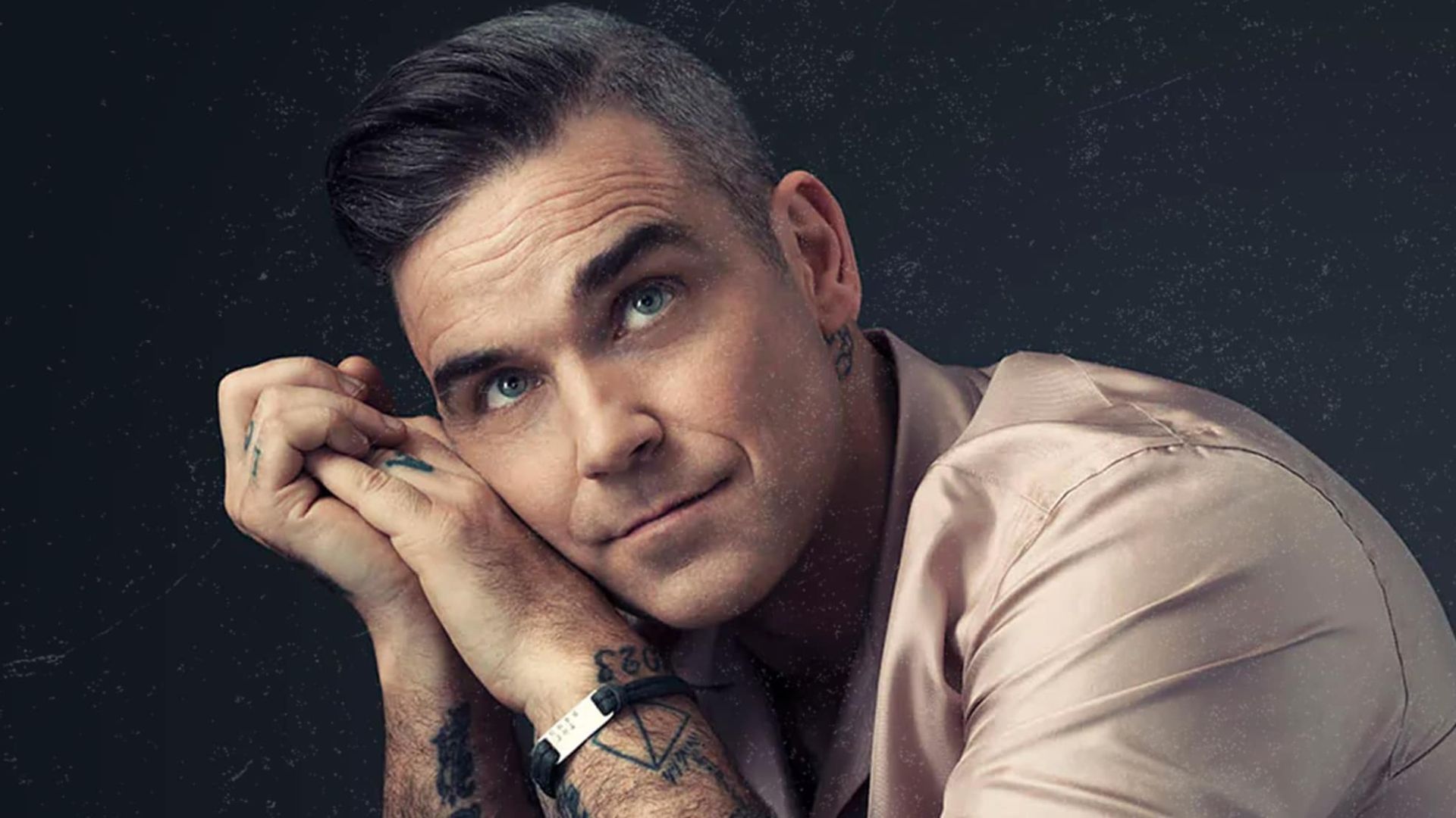 Malattia di Parkinson: parla Robbie Williams
